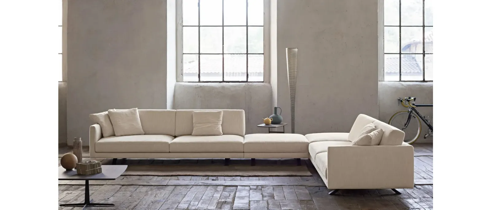 Corner sofa in Bart fabric by Doimo Salotti.