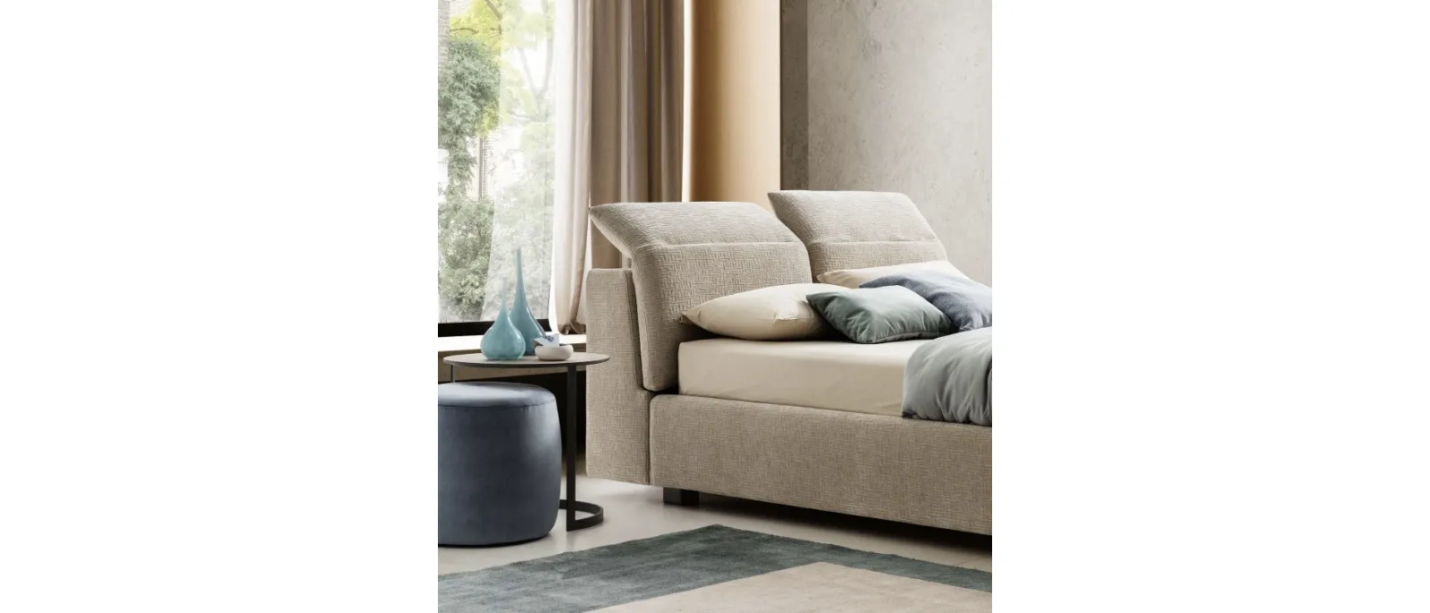 Padded fabric bed with a reclining headboard, model Apollo by Le Comfort.