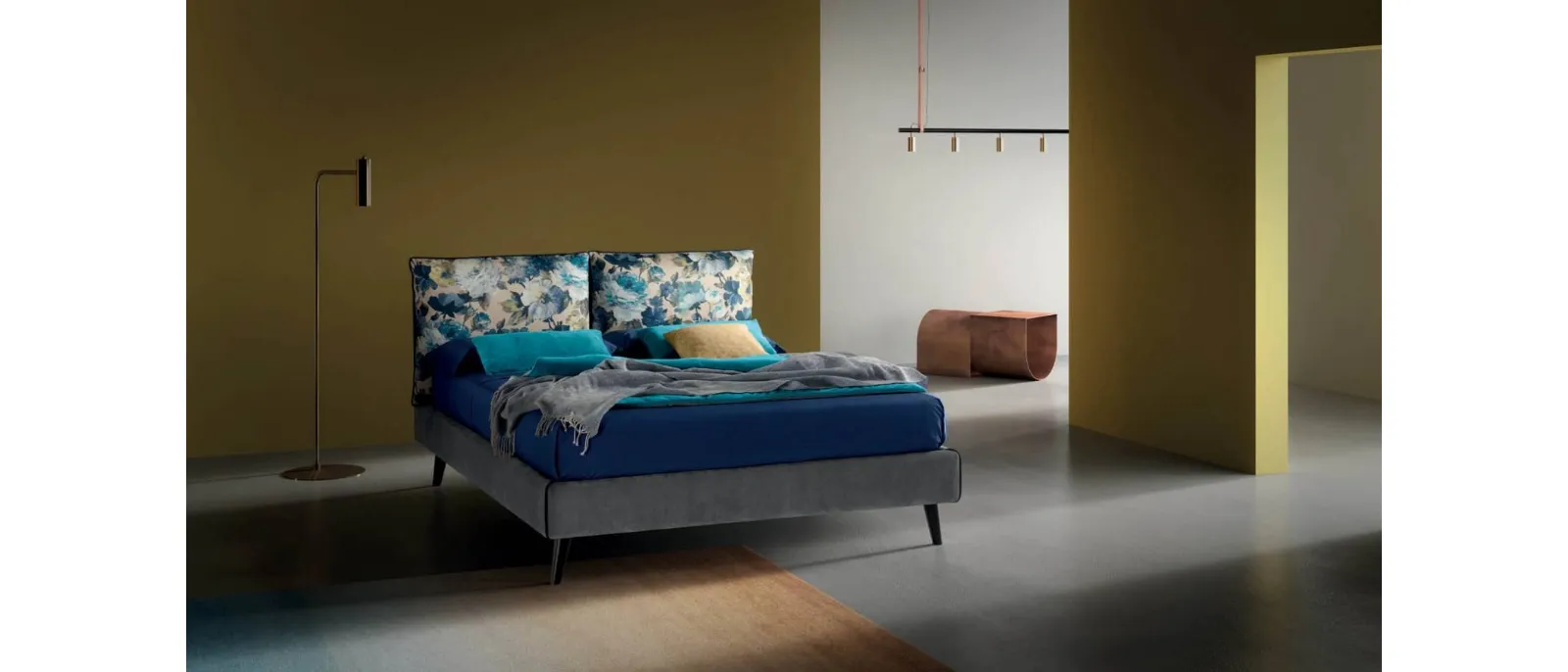 Arty upholstered bed with adjustable headboard by Bside