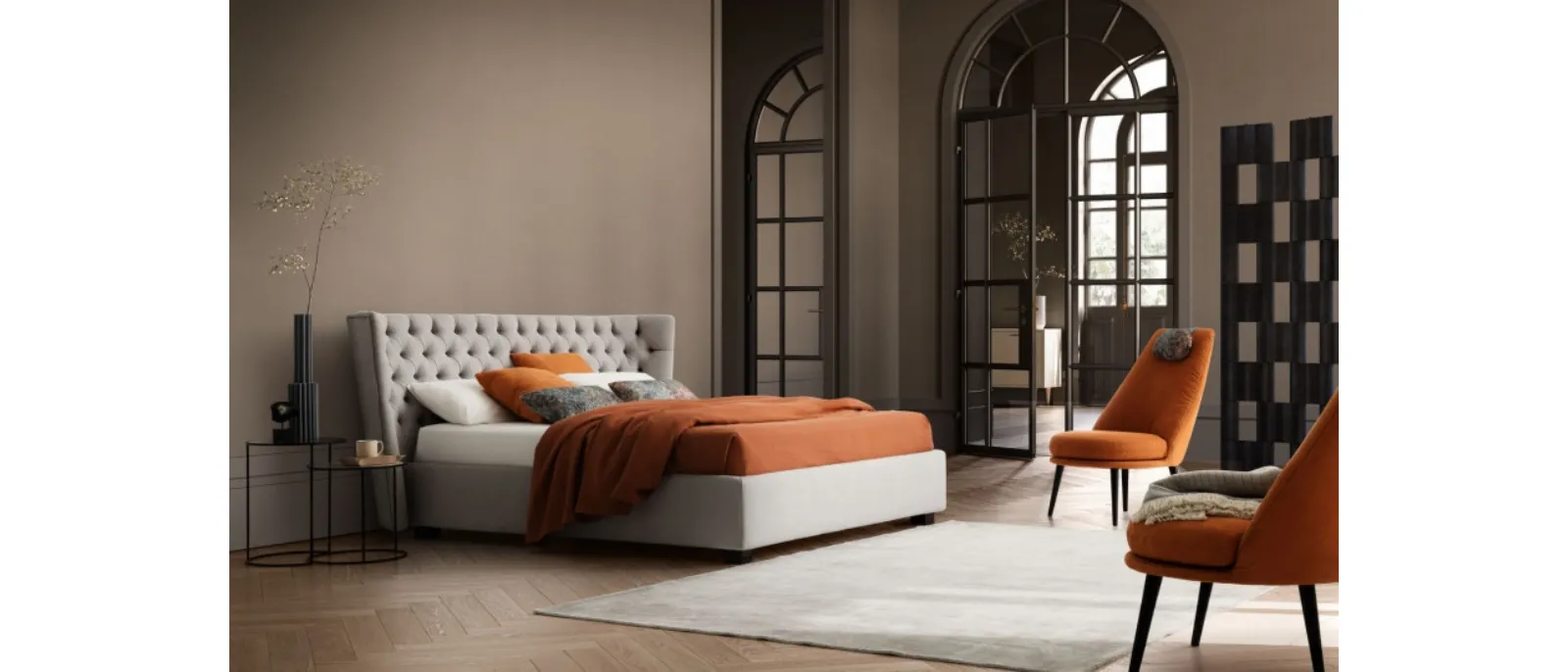 Carved wooden headboard with soft upholstery covered by fabric or leather and with three padded sections