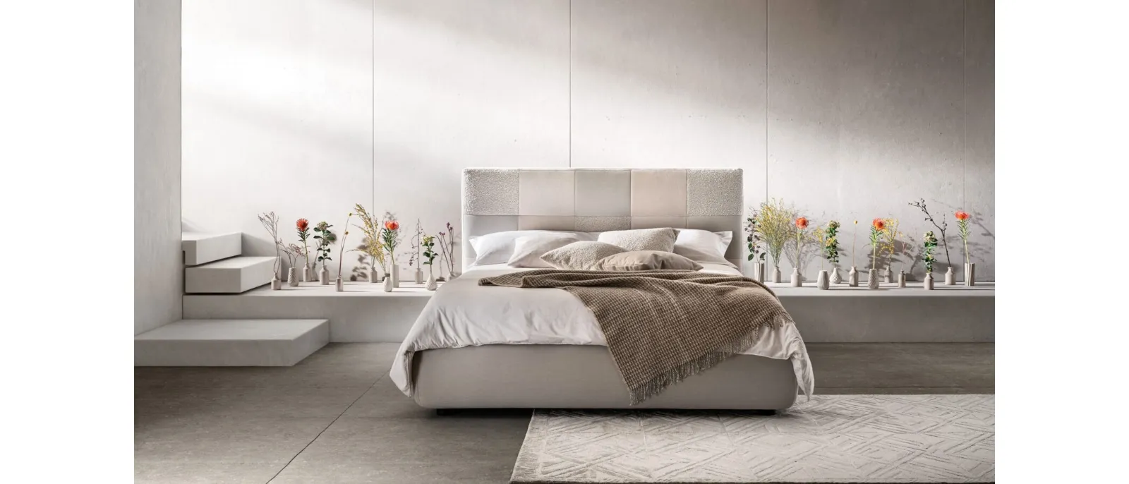 Quilted fabric bed with Essential headboard by Bside.