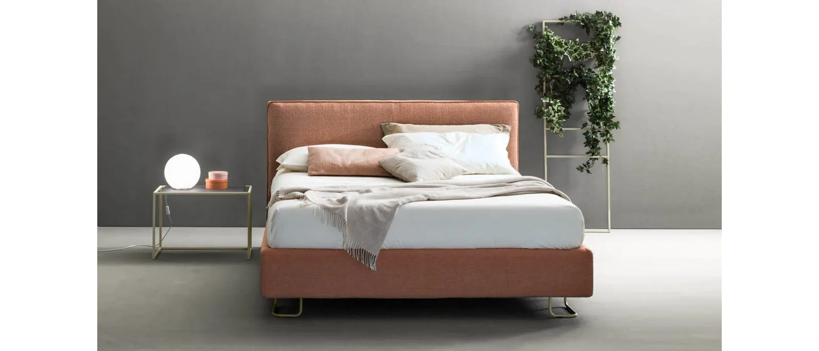 Modern fabric bed with Bside Piping headboard.