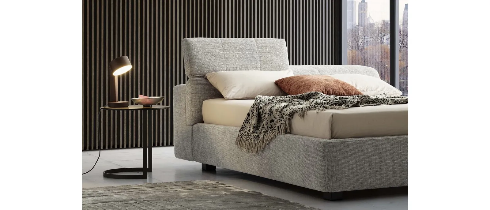 Reclineable bed with headboard Tower by the brand Le Comfort. The backrest