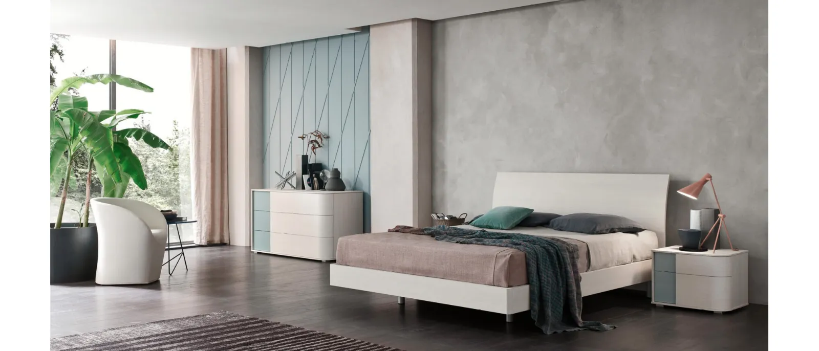 Innovative bed with the new headboard Vela of