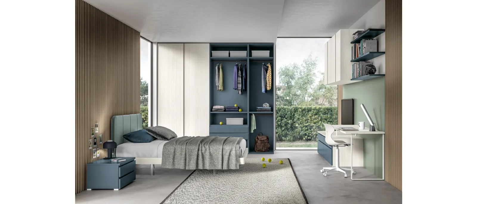 In questa camerata per ragazzi l’arredamento e le finiture colorate