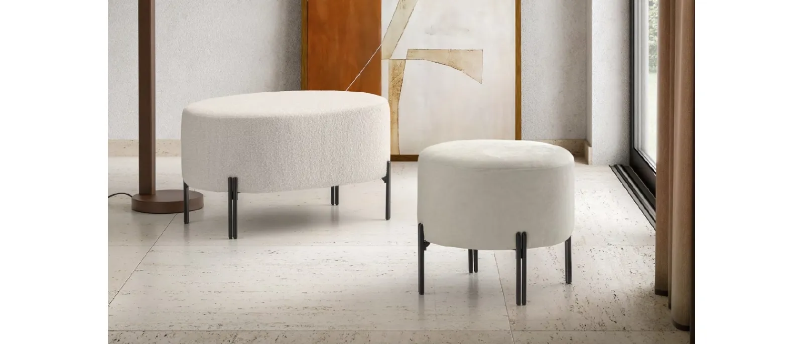 Nanà poufs and small tables are made of fabric and metal feet by Le Comfort. A unique and