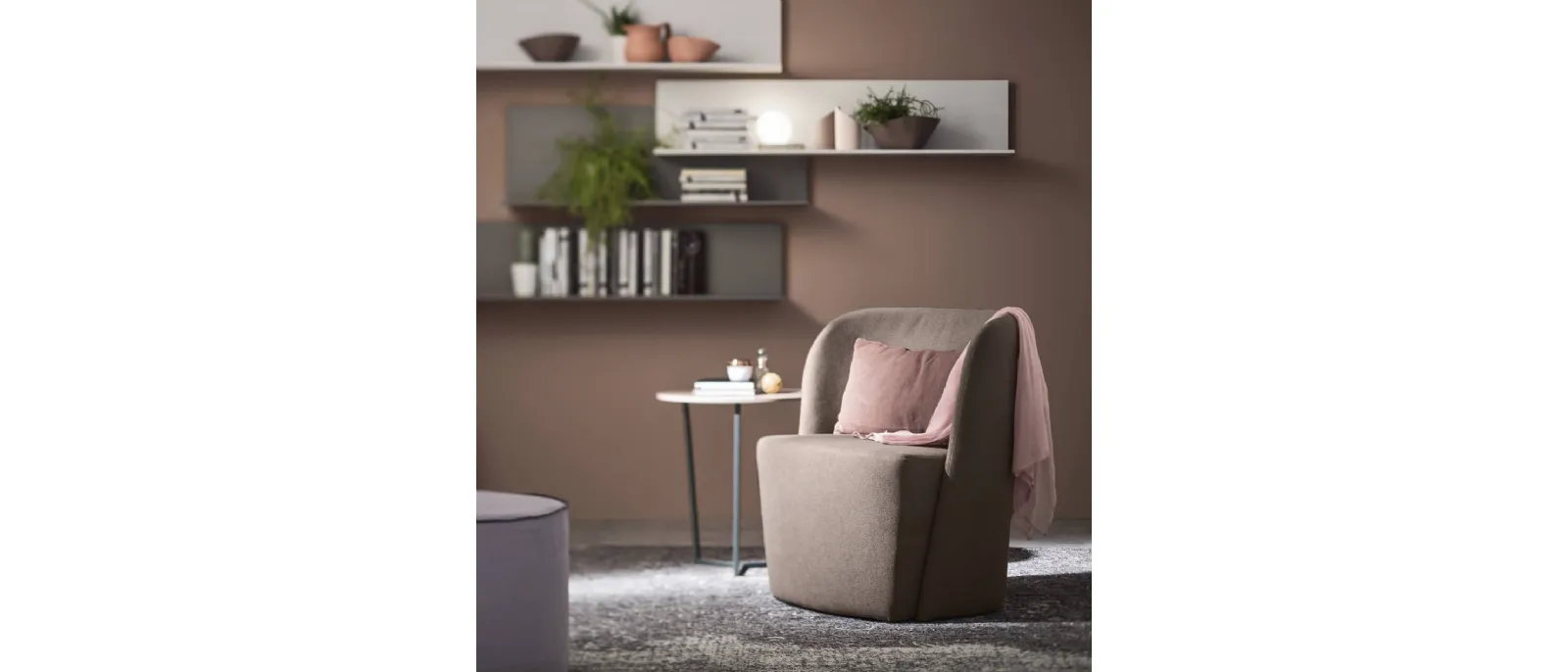 Sitting on an oval footrest in polished nickel