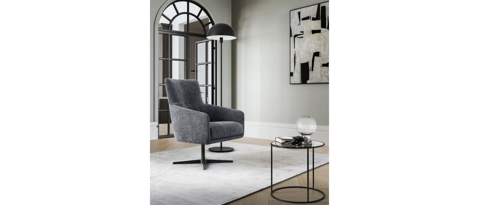 Elodie armchair by Le Comfort is covered with fabric of a