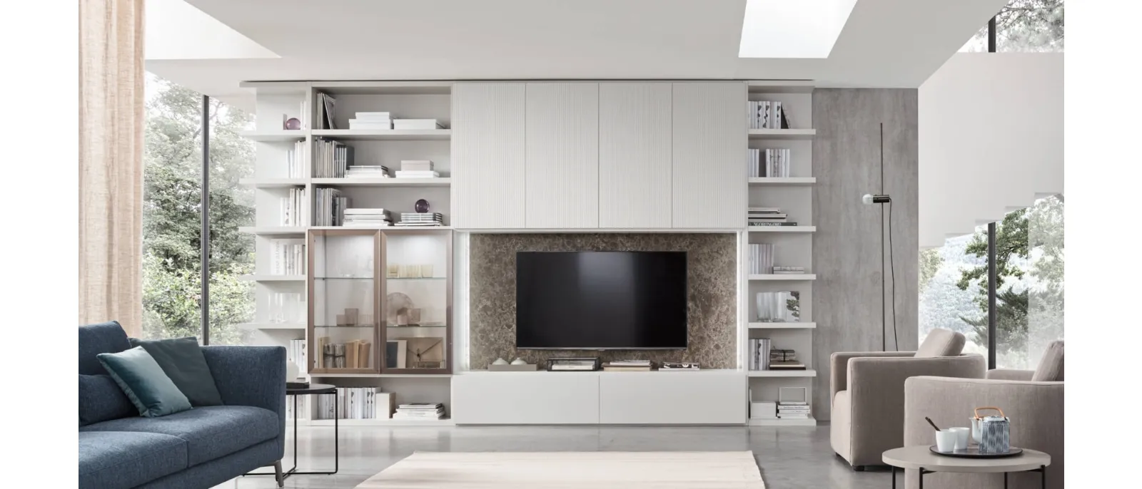 The wall-mounted cabinet system comprises several units designed to adapt their dimensions and shape to specific spaces or