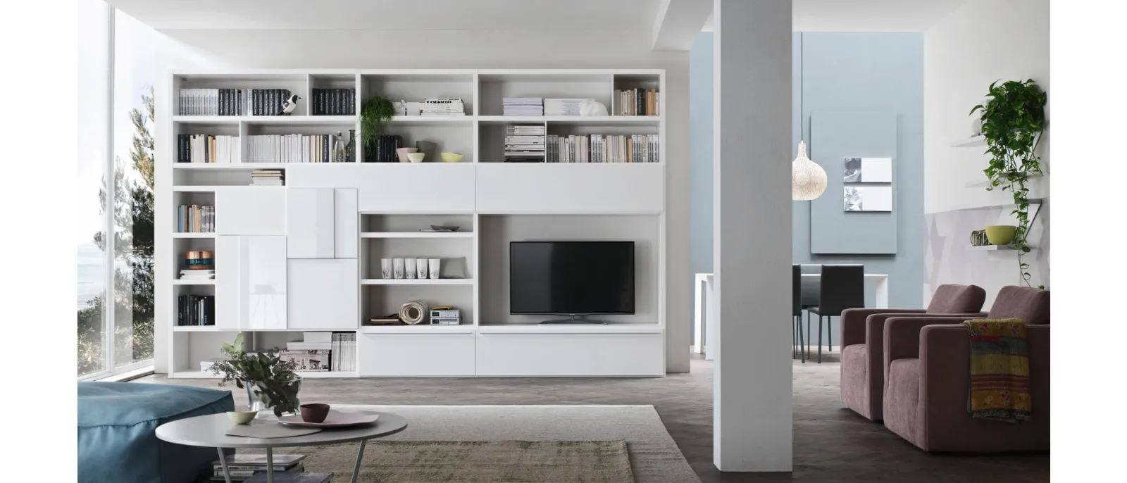 System Spalla is a versatile modular furniture system for living rooms and bedrooms made of wood or lac