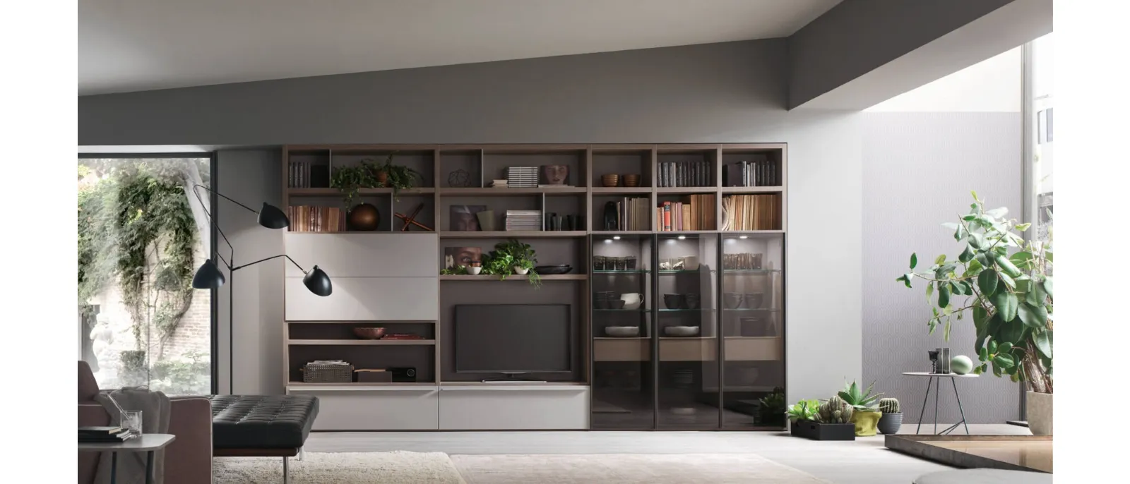 The wall-mounted system comprises shelves of different depths and lengths and various accessories for storing books, games