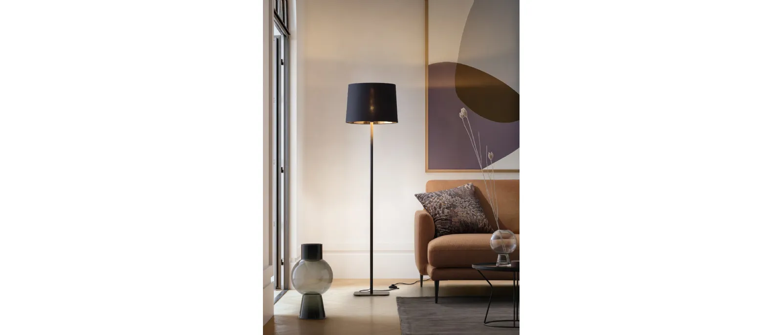 With its large size and the warmth of wood on its stem and top finial, the 64” tall Hygge Floor
