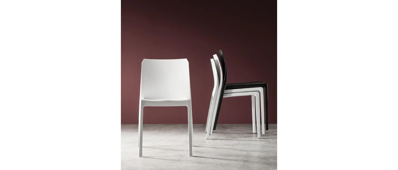 Clelia is a stacking chair by Maronese, the most original and versatile model of