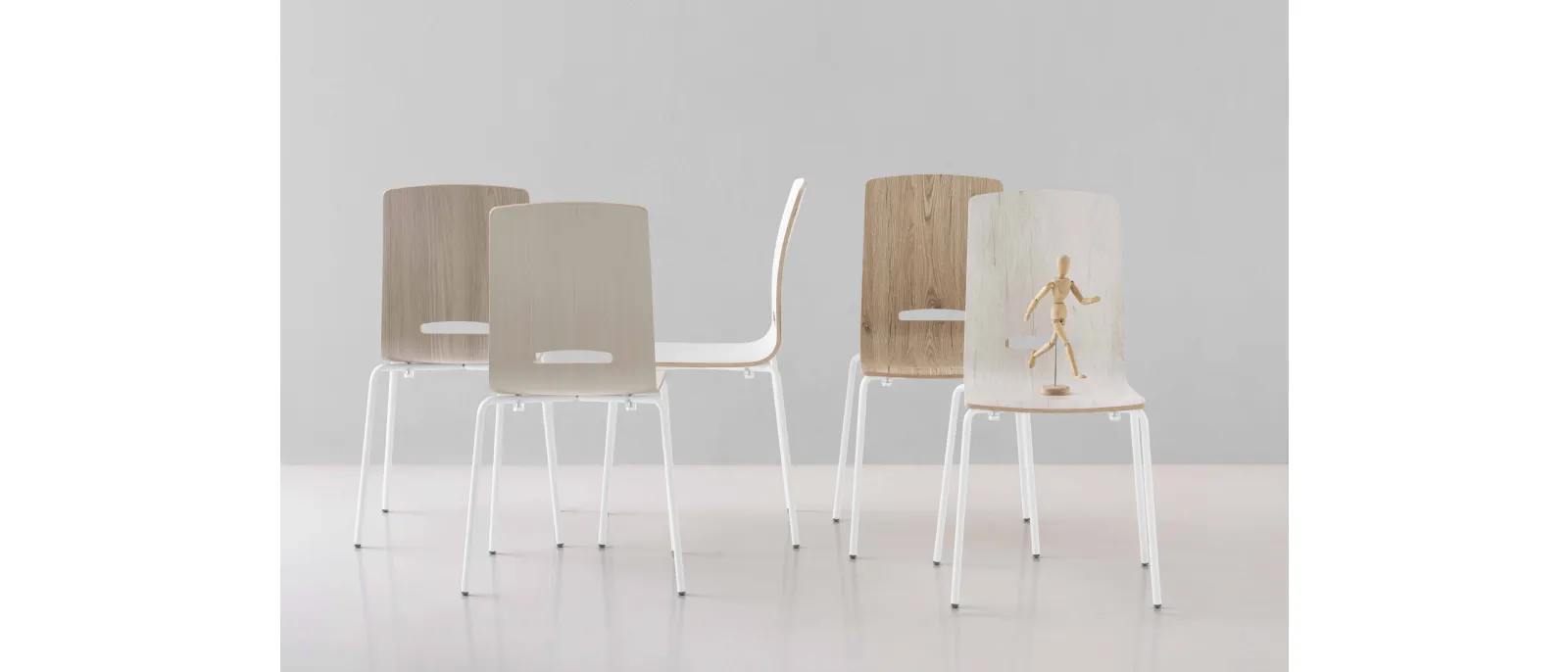 Stackable Flora chair in melamine-faced plywood wood by Pointhouse.