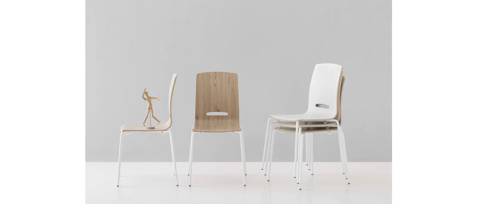 Stackable Flora chair in melamine multi-layered wood by Pointhouse.