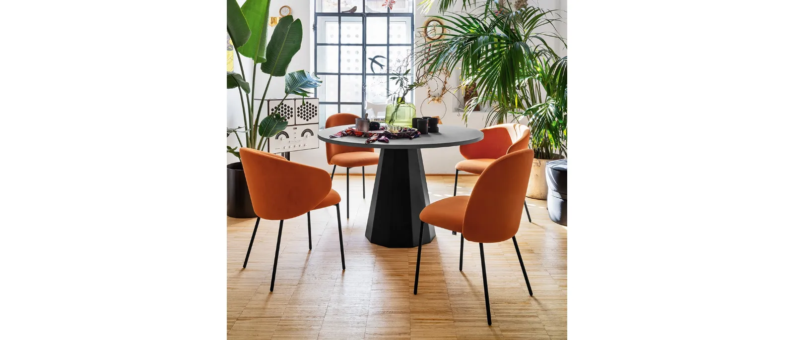 Connubia's Tuka padded fabric chair