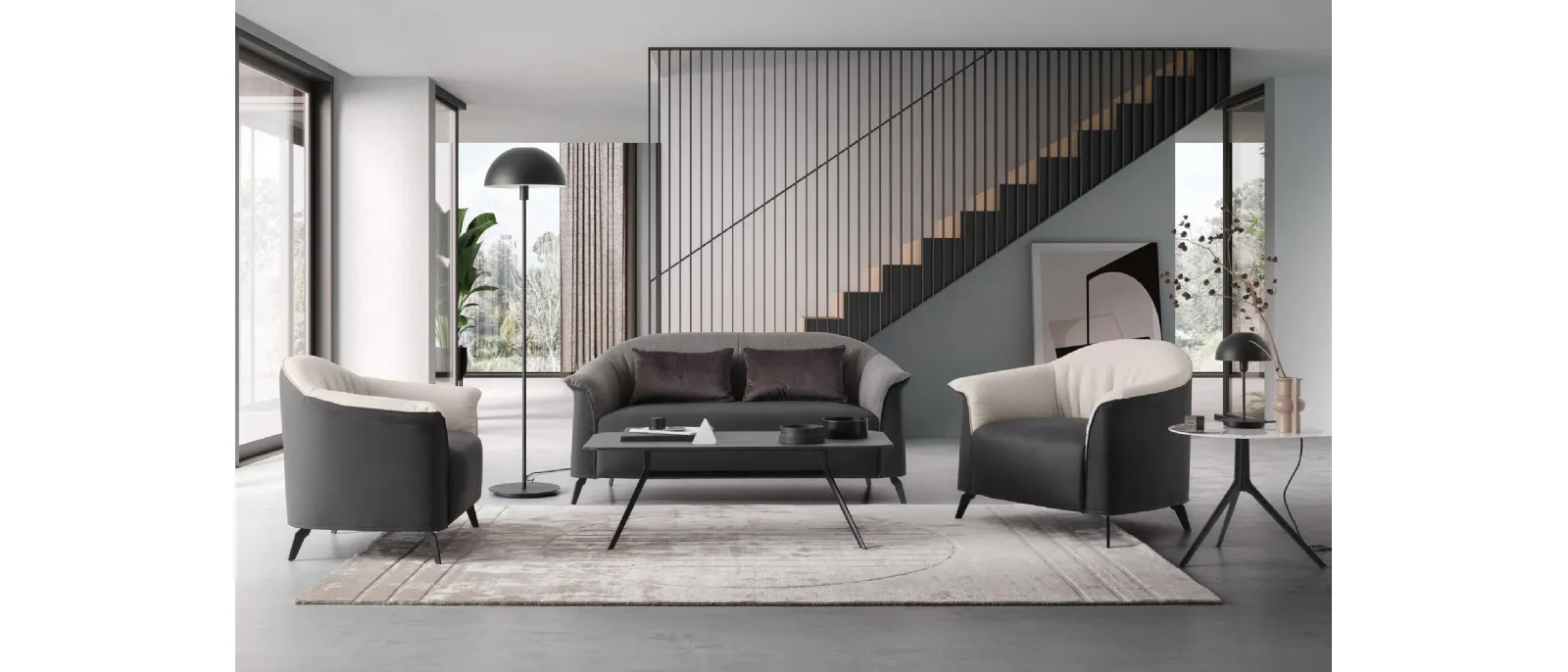 Caroline is a linear sofa covered with fabric. The frame of the seat and back cushions are