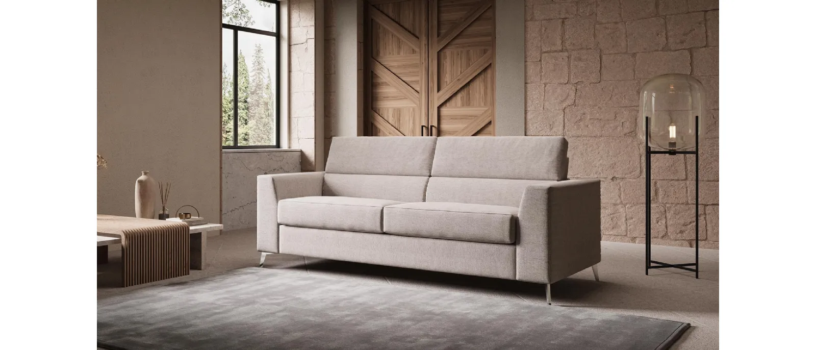 The sofa bed “Country” has a rectangular shape with arms and