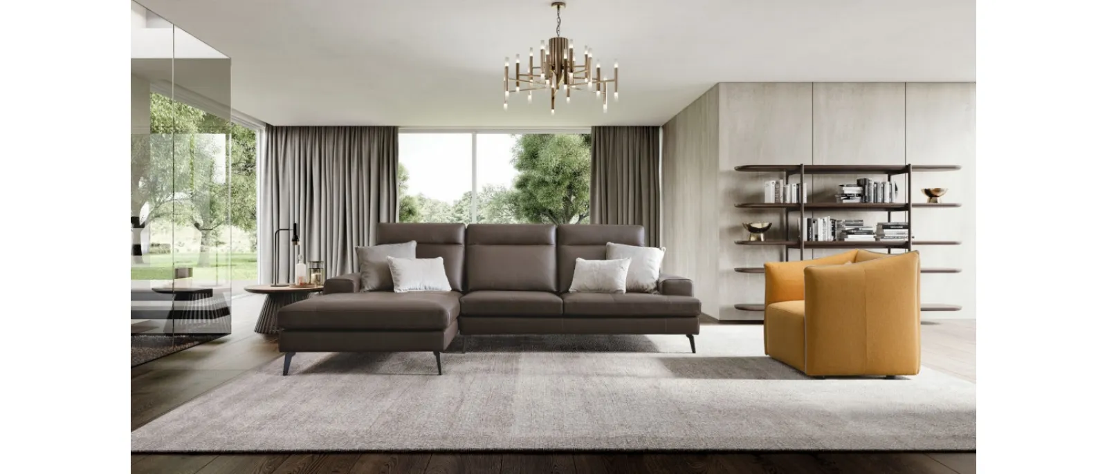 Emmet leather sofa with chaise longue by Le Comfort is made of a frame