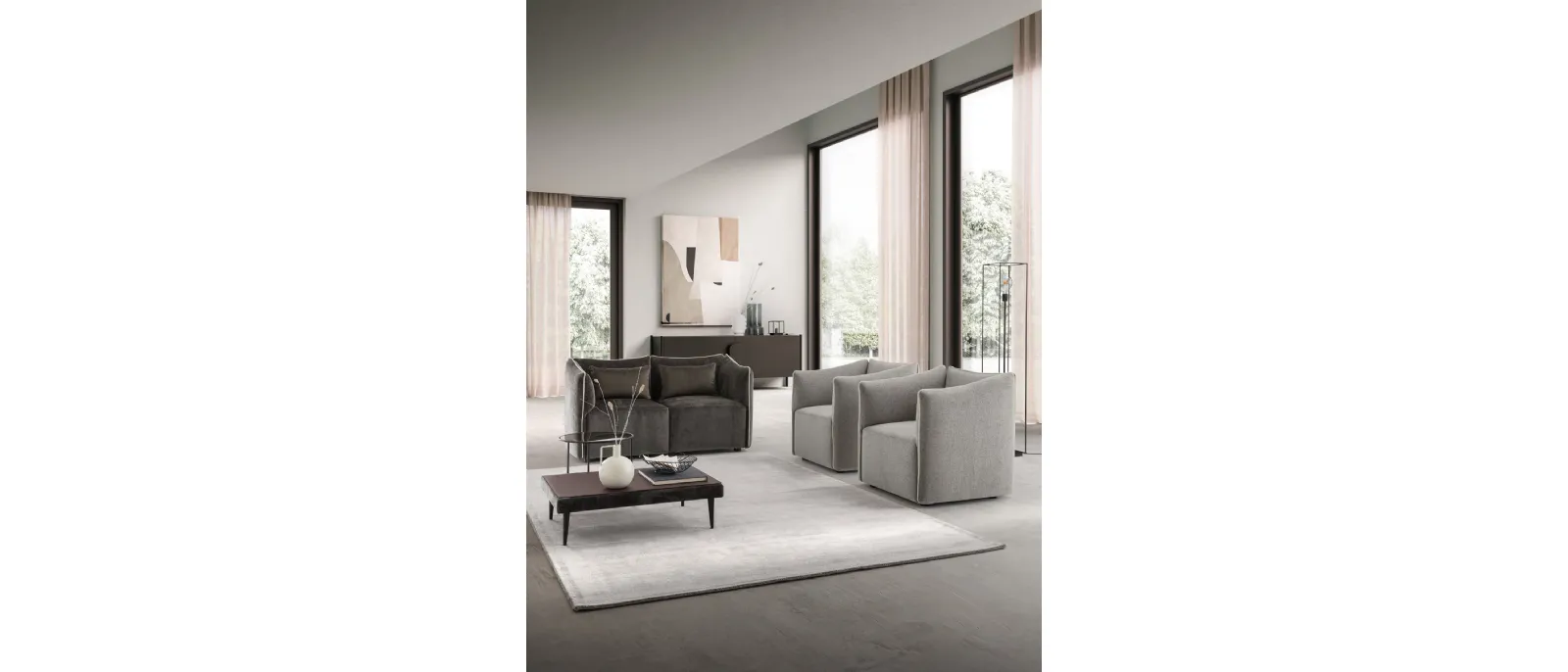 Le Comfort sofa love seat in fabric padded is the two-seat model Kubik from Le Comfort. The design of this
