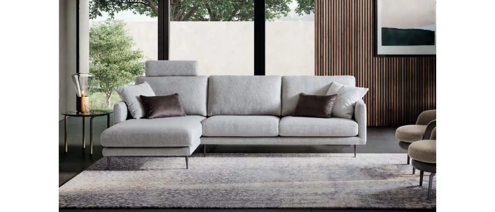 The new sofa with peninsula is composed of a base upholstered on three sides