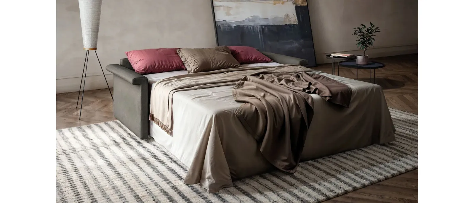 Titus linear sofa bed by Doimo Salotti