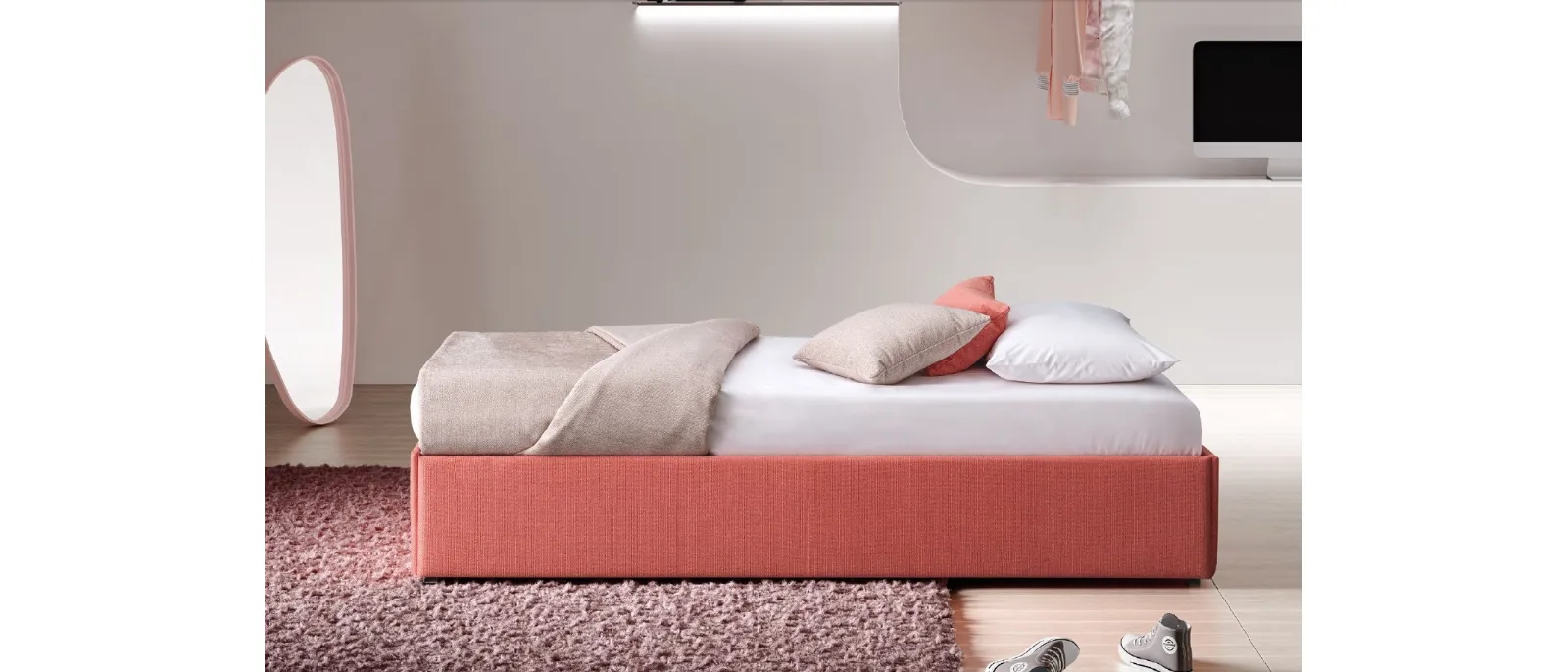 A bed with an opening frame for extra beds from Le Comfort in fabric and with two storage baskets under