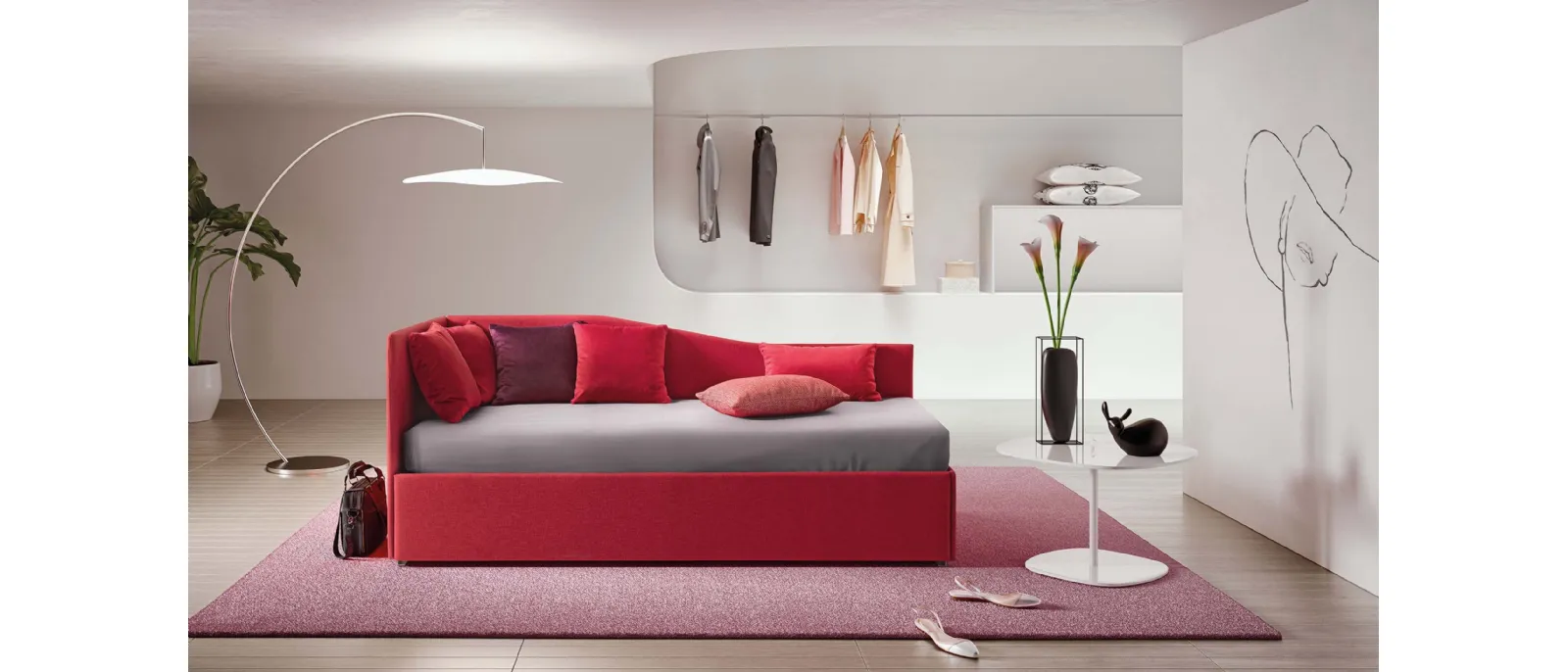 Solanum is an extra single bed by Le Comfort made with a metal structure and fabric-covered