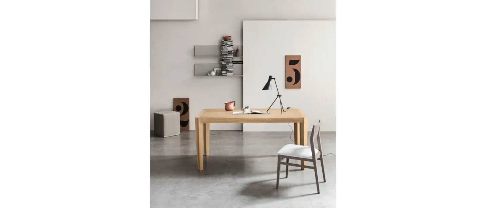 Prisma is a table with an extendable top made from solid marble and