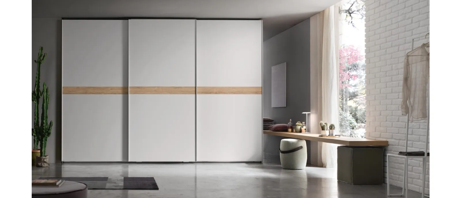 The wardrobe with sliding door Fast is a solution that combines elegance and functionality to