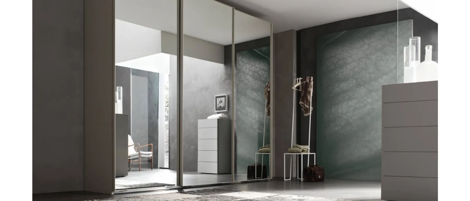 This wardrobe with sliding door is available as a standalone unit or it can be used to