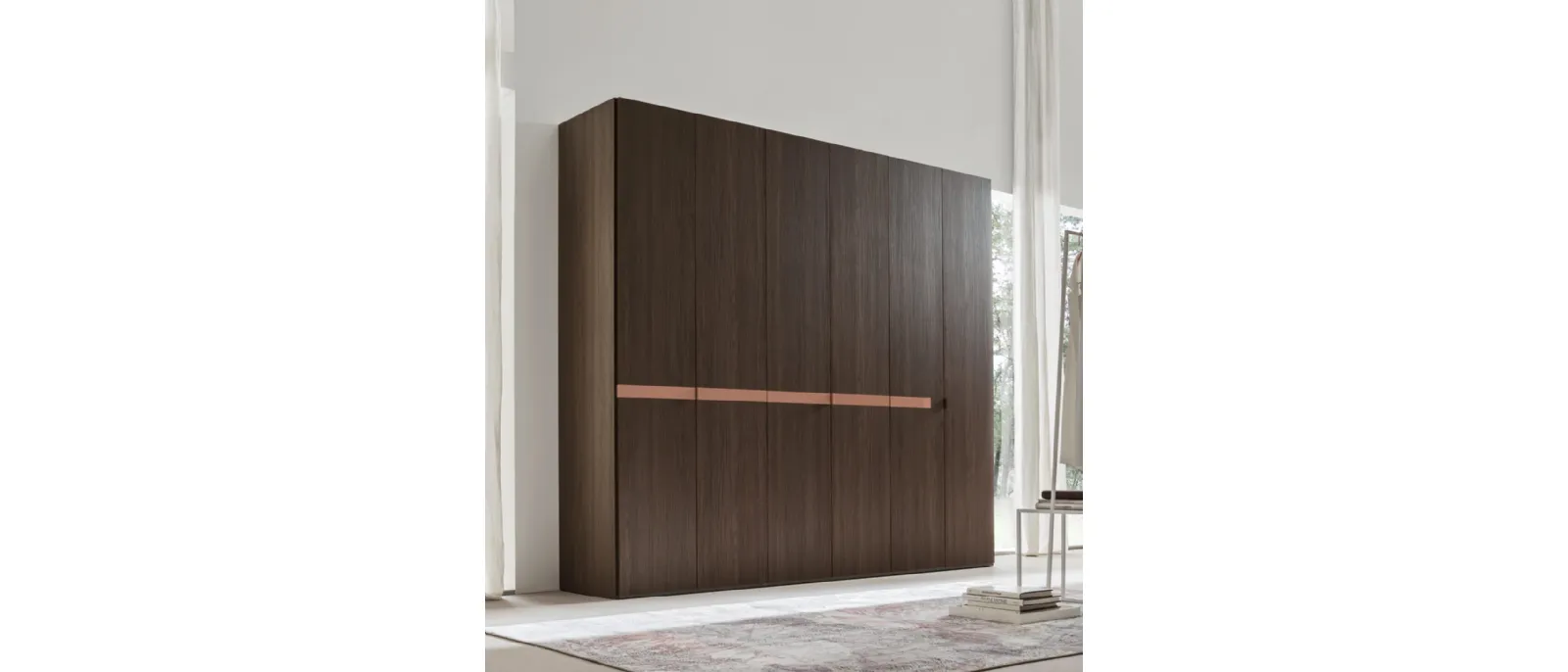 Wrap is a wardrobe by Maronese whose double door swing open and can